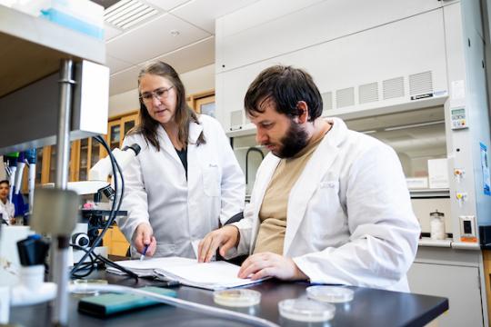 Student and Professor in Science Lab
